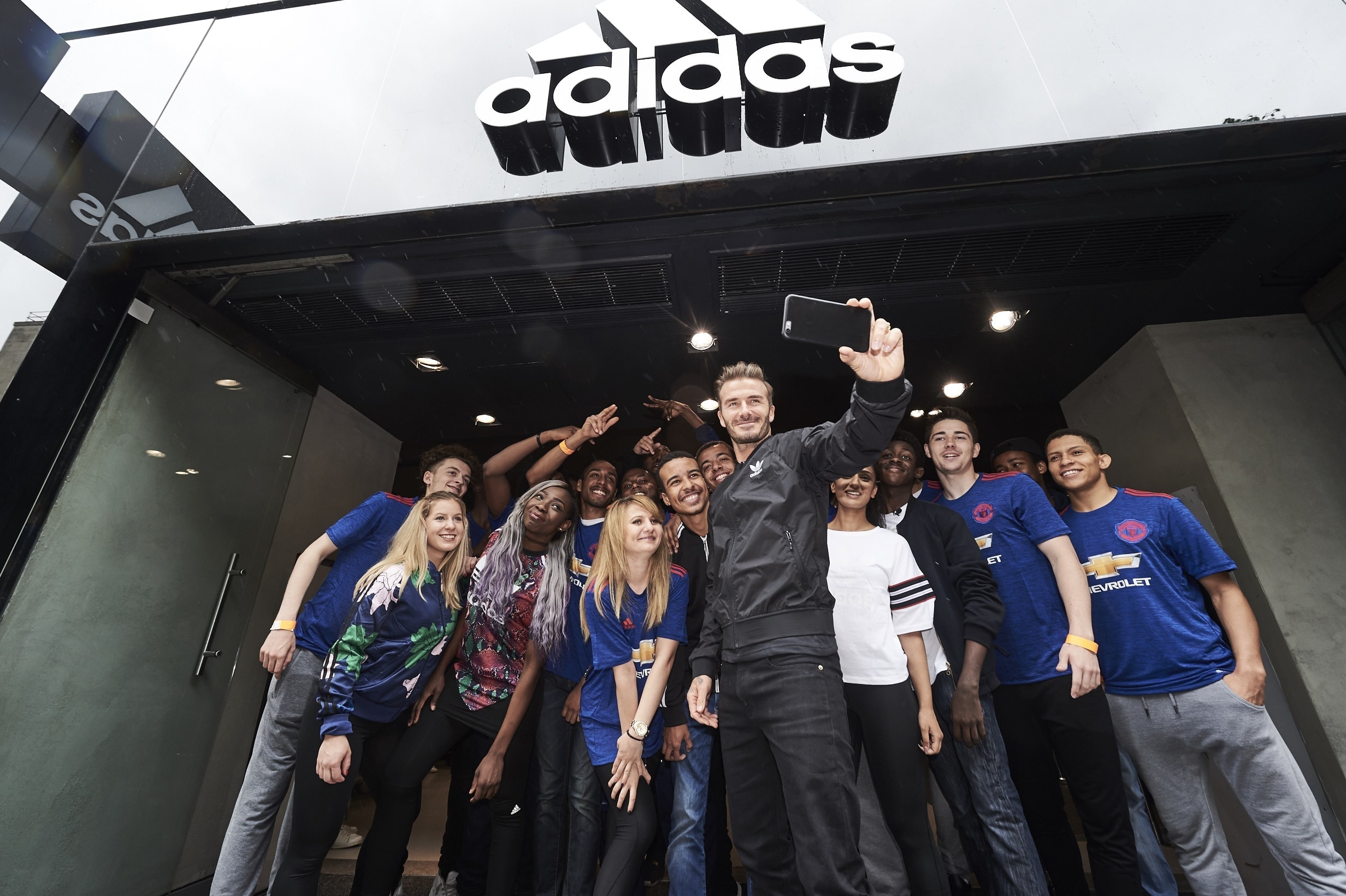 BECK IN TOWN: David Beckham meets fans outside the newly re-opened adidas store on Oxford Street. The Man Utd legend launched the club’s new away shirt, available online and in-store now (Credit: Ben Duffy / adidas UK)