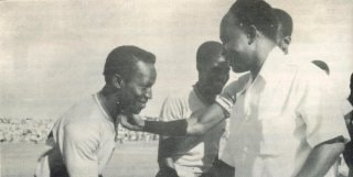 C.K Gyamfi - during his time as captain of the Black Stars - being greeted by Kwame Nkrumah before a game
