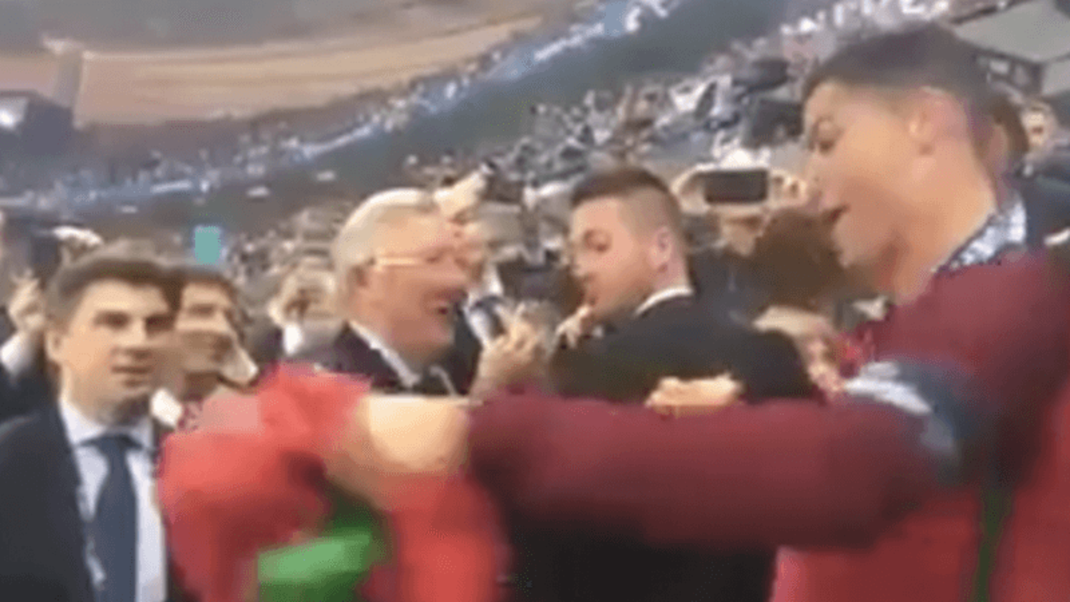 Sir Alex Ferguson embraces Cristiano Ronaldo during Portugal's Euro 2016 celebrations