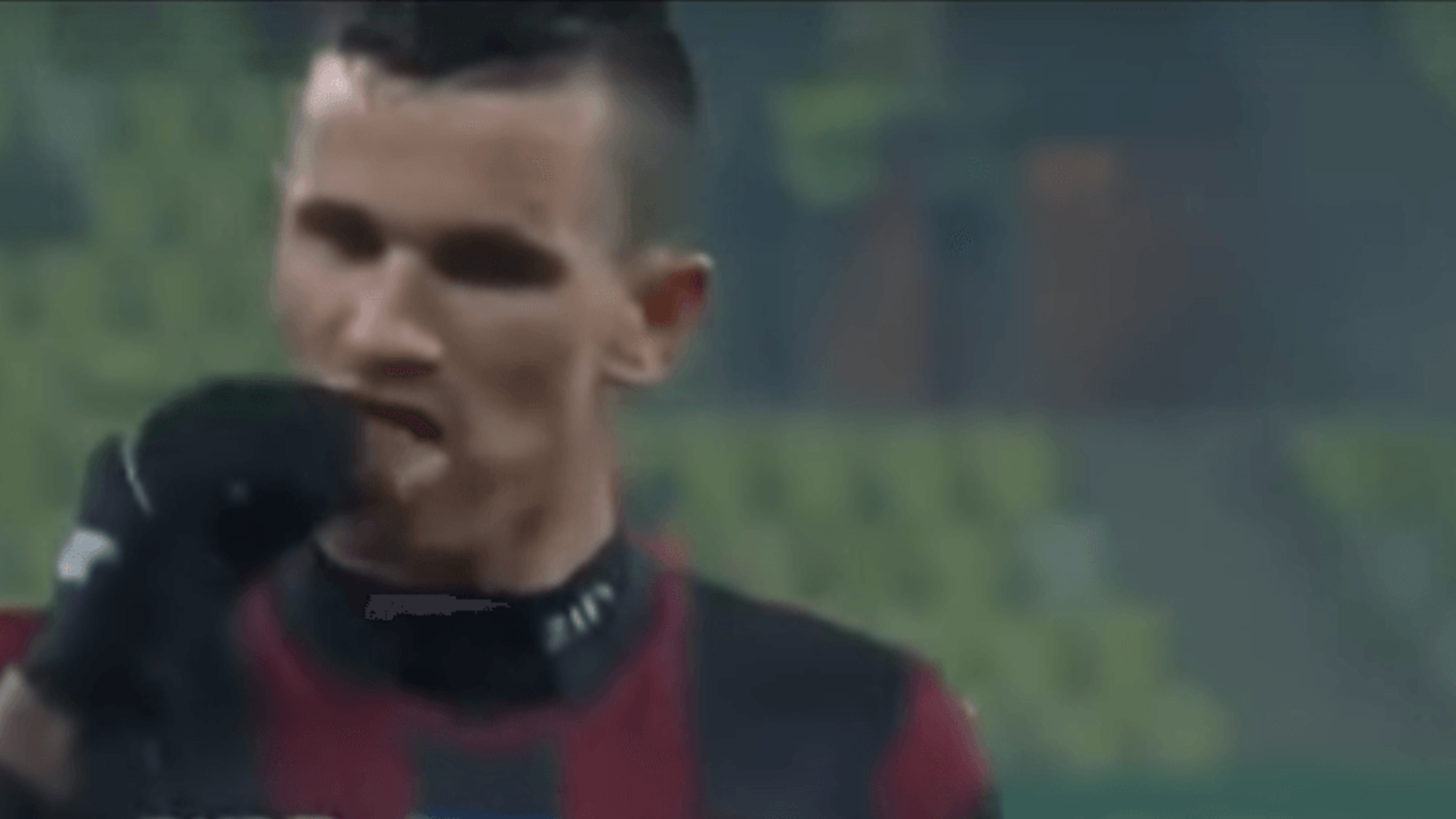 Polish player eats chocolate launched at him by fans, then scores penalty